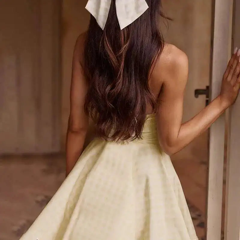 Robe patineuse jaune évasée sans manches