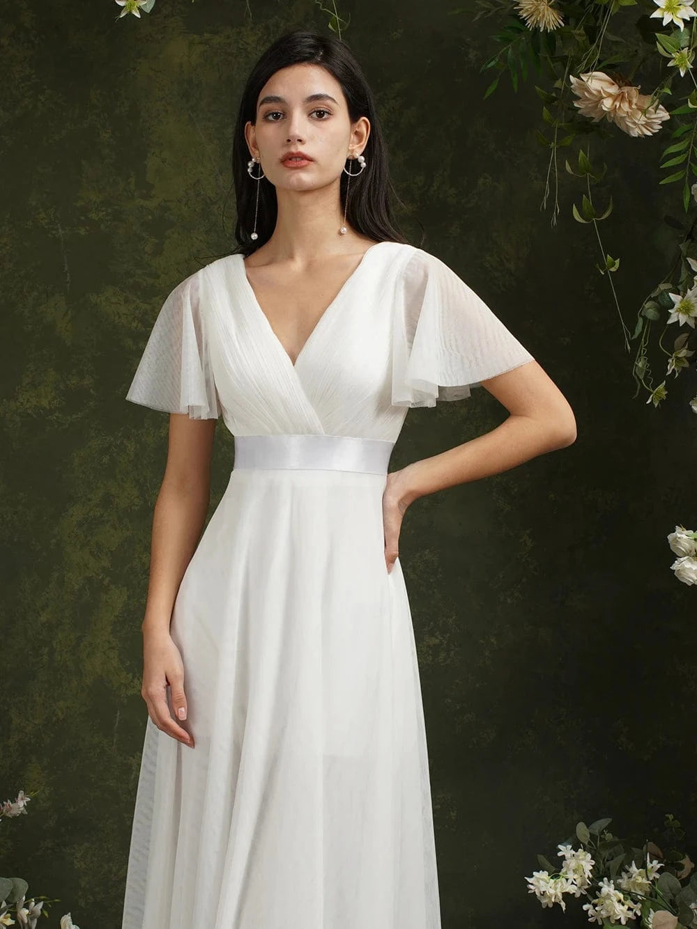 robe demoiselle d'honneur chic blanche longue fluide sans manches silhouette trapèze élégante