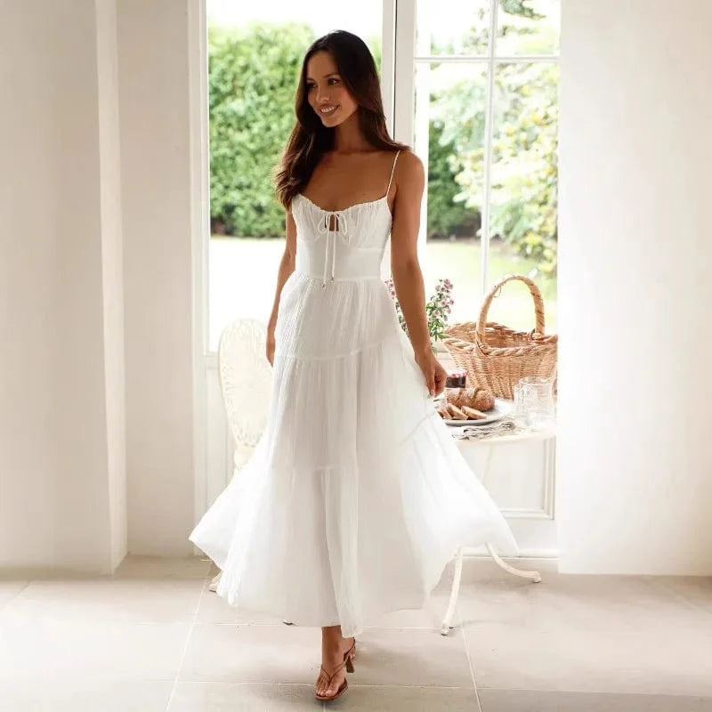 robe blanche fluide bohème longue sans manches pour mariage invité chic ou cérémonie estivale