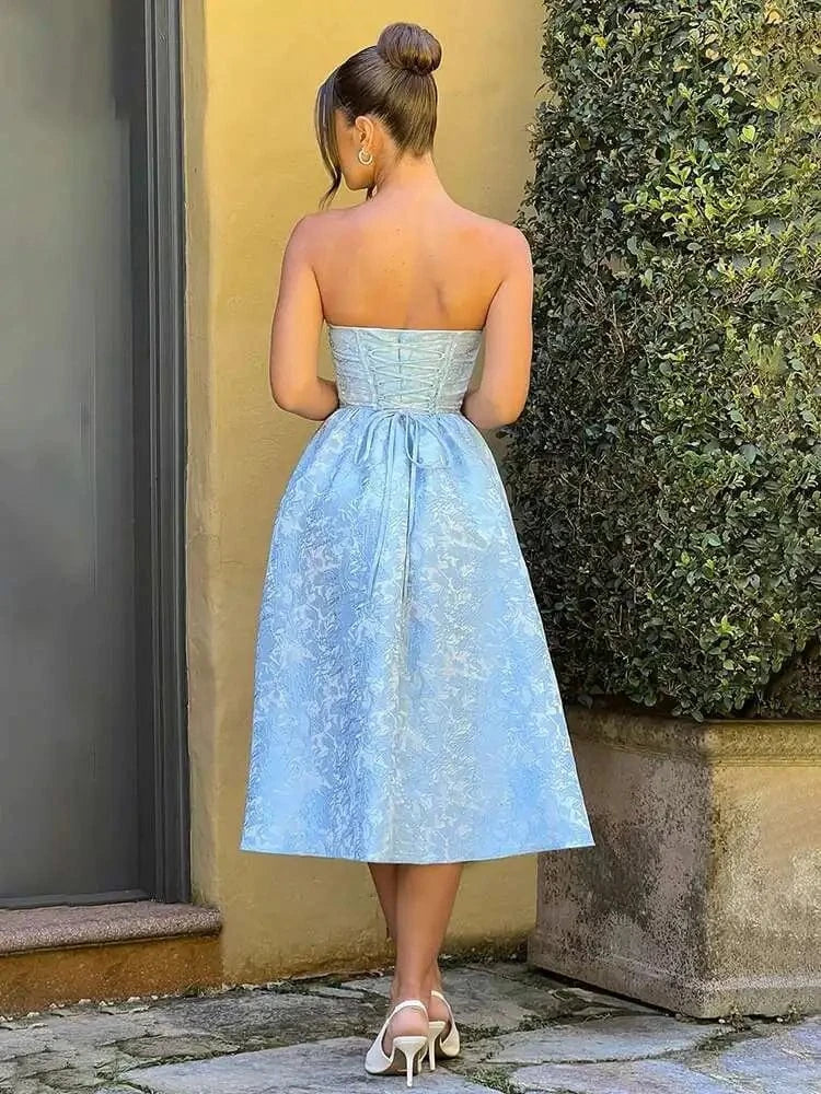 Robe de cocktail bustier trapèze midi