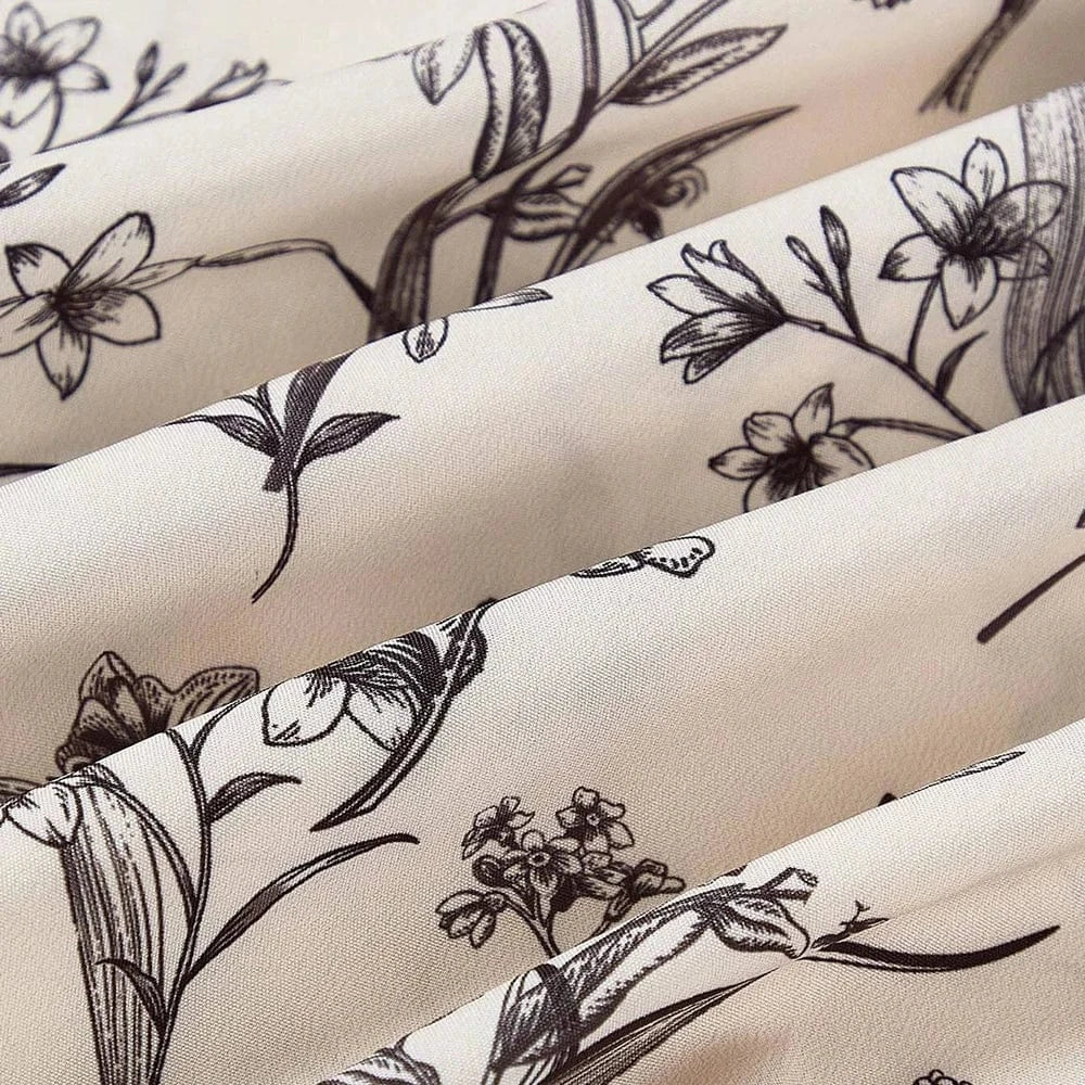 Robe de cocktail fleurie courte décolleté carré