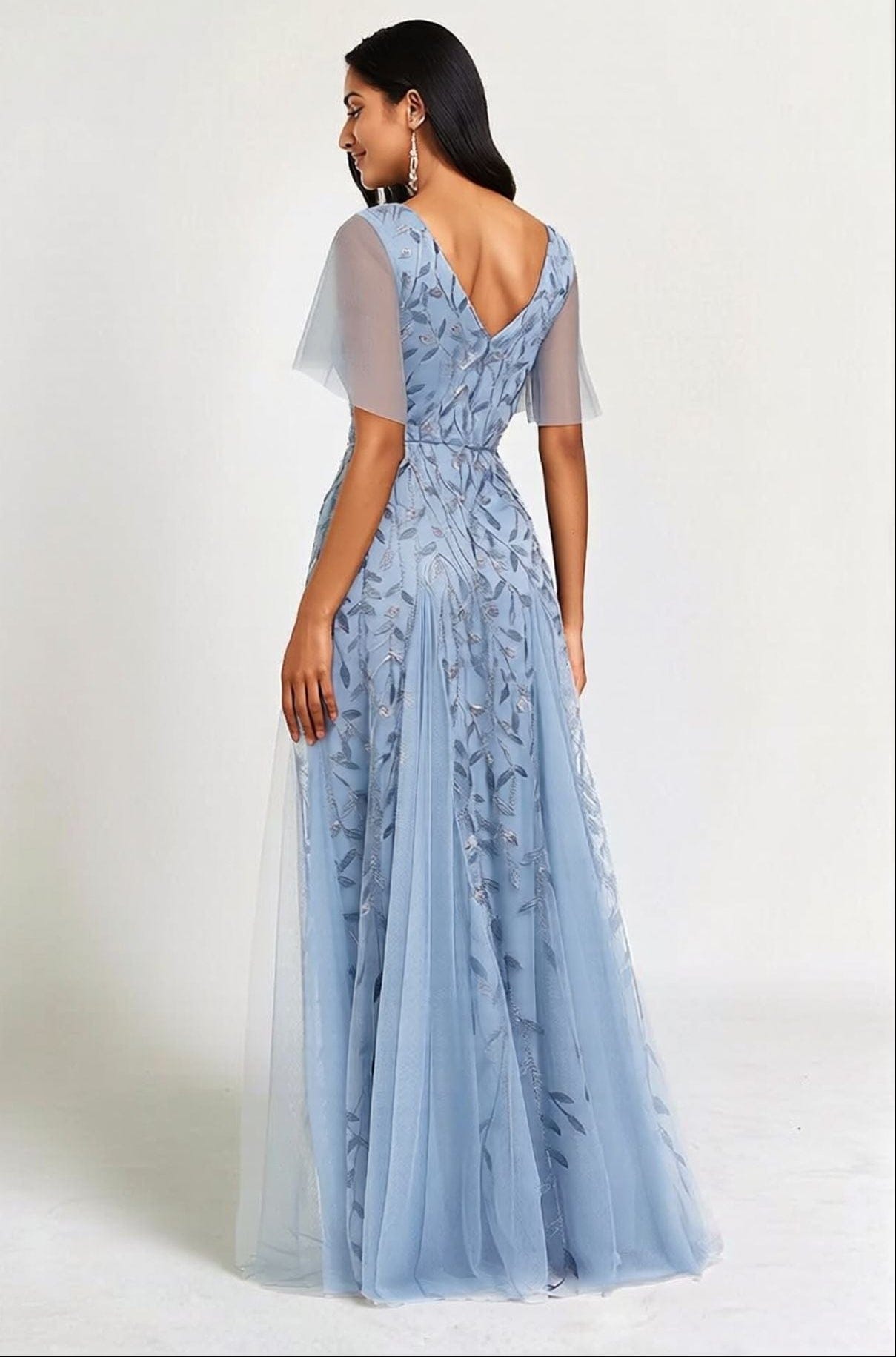 Robe de soirée bleue motif paillettes