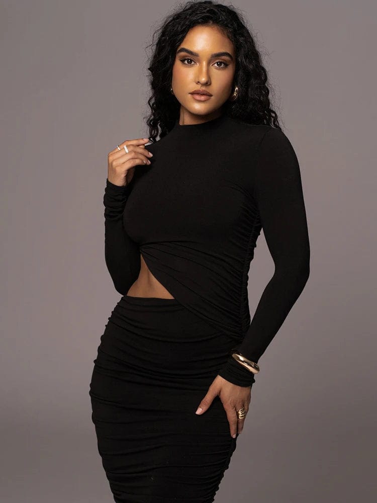 Robe de soirée sexy noire, moulante manches longues, idéale pour soirée chic ou événement glamour.