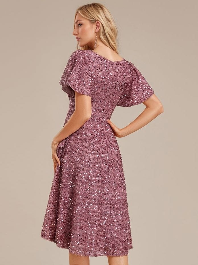 Robe de soirée rose à sequins manches courtes