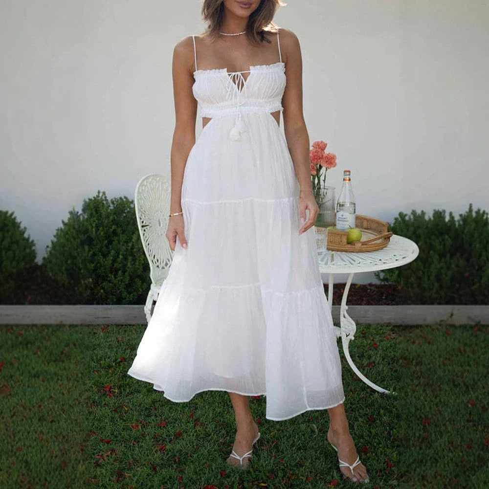 robe été bohème midi fluide pour plage ou mariage invité chic, coupe trapèze sans manches