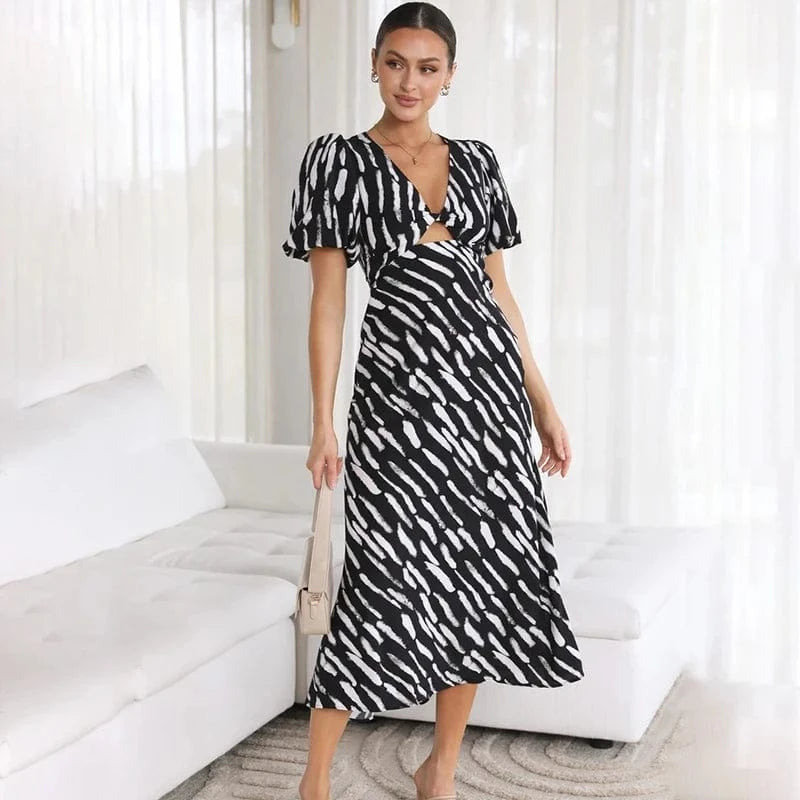 robe de cocktail midi fleurie pour soirée chic motif élégant manches courtes coupe fluide féminine
