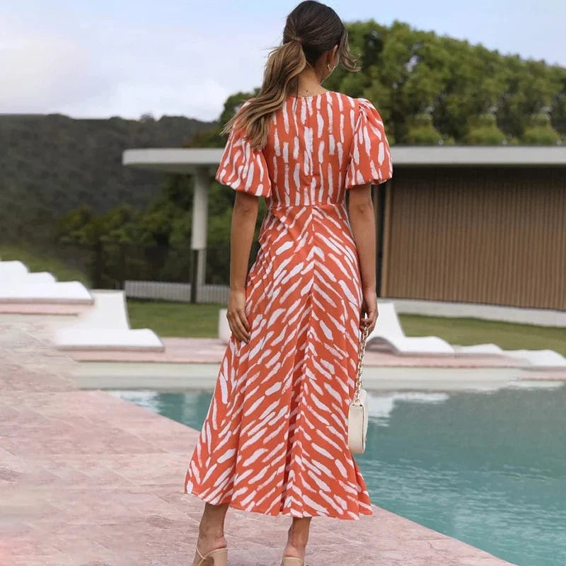 robe de cocktail été orange midi avec manches bouffantes élégante et fluide pour événement chic