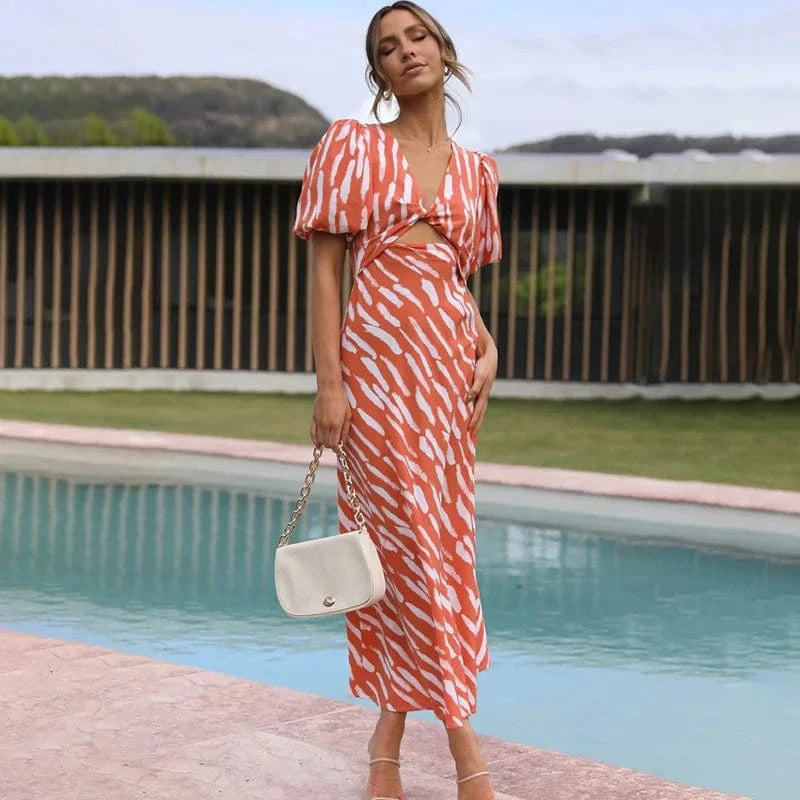 robe cocktail été orange midi manches bouffantes élégante et fluide pour événement chic en journée