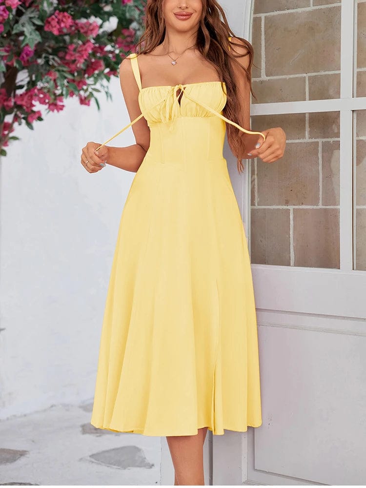 Robe été jaune évasée pour mariage invitée chic, longueur midi, style sans manches.