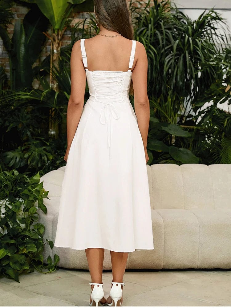 Robe été bohème blanche longue trapèze sans manches, idéale pour une journée ensoleillée.