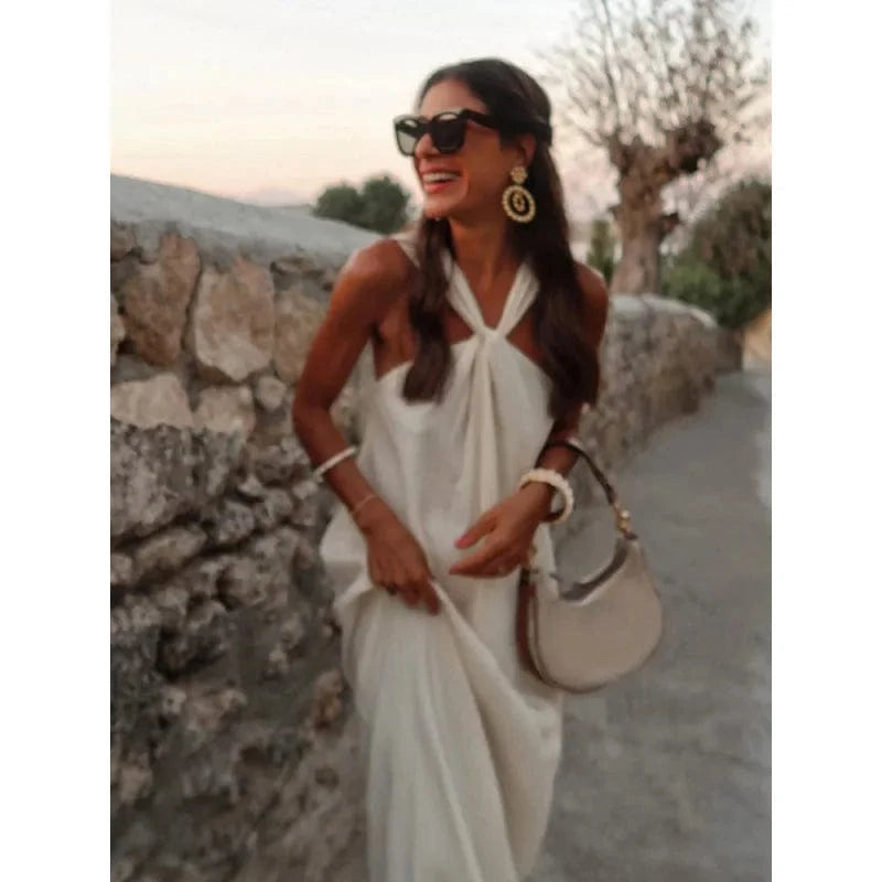 robe de plage blanche longue sans manches fluide et légère idéale pour l'été et les vacances au soleil