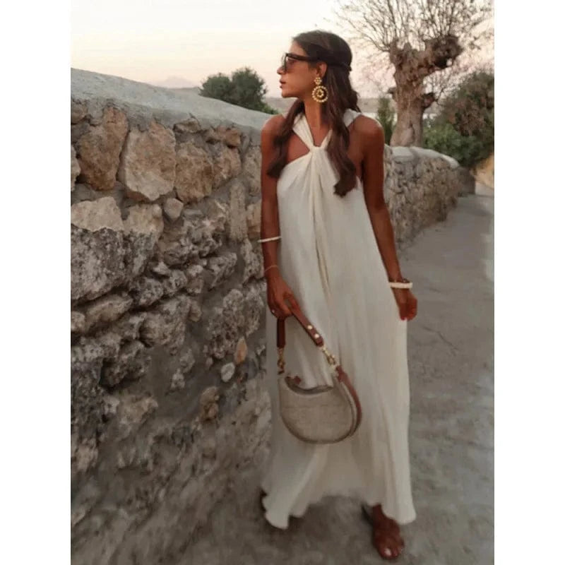robe de plage blanche longue sans manches style fluide femme parfaite pour l'été et les vacances au soleil