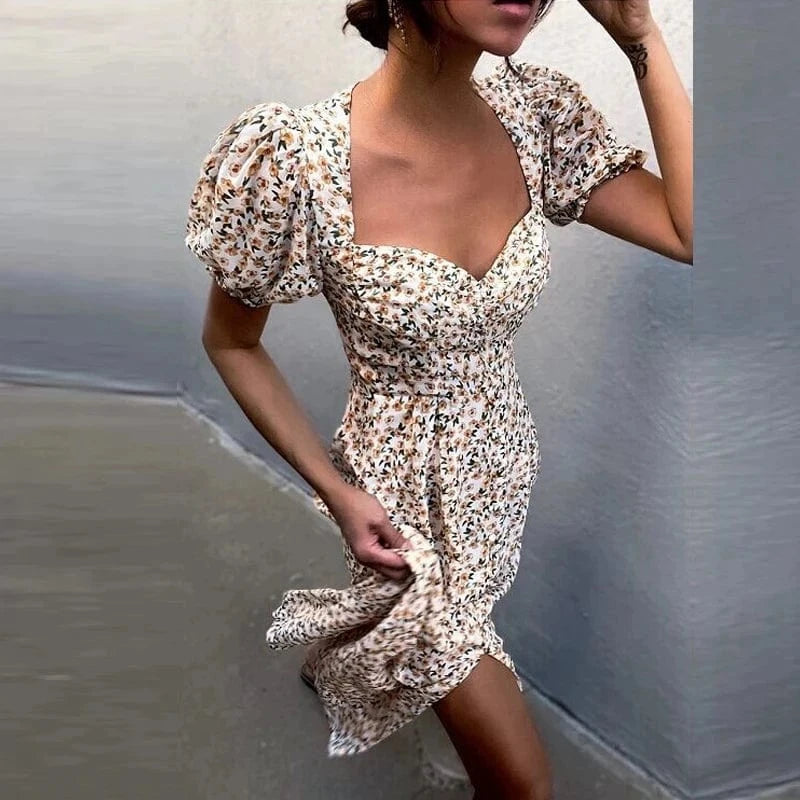 Robe fleurie fendue manches courtes bouffantes