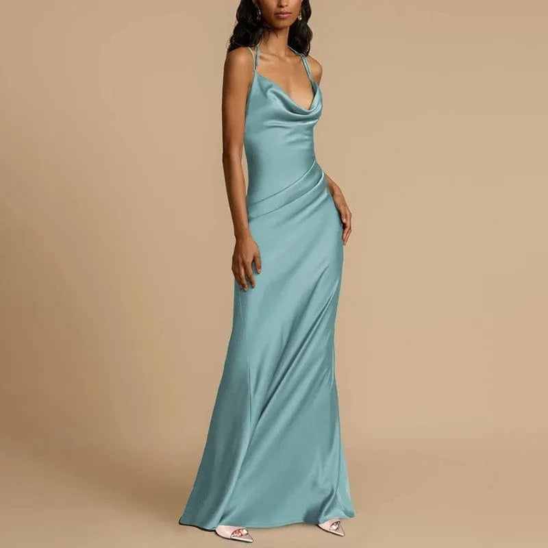 robe longue verte chic pour invitée de mariage d'été avec coupe fluide et manches courtes élégantes