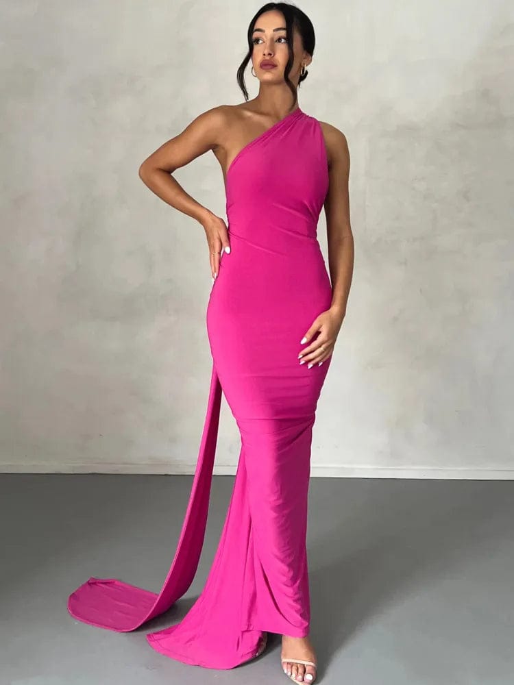 Robe longue rose chic pour soirée, style dos nu élégant, silhouette moulante et évasée pour gala ou mariage.