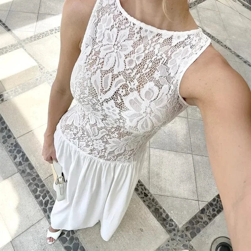 Robe longue fluide sans manches haut en dentelle