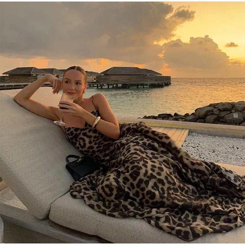 robe de soirée longue léopard chic moulante sans manches idéale pour un événement glamour ou un gala