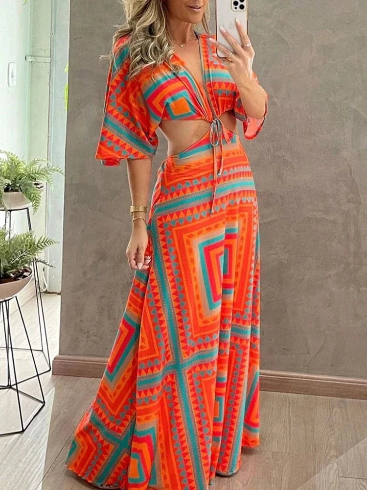 Robe été bohème longue orange à motifs géométriques, fendue, idéale pour la plage ou soirée chic