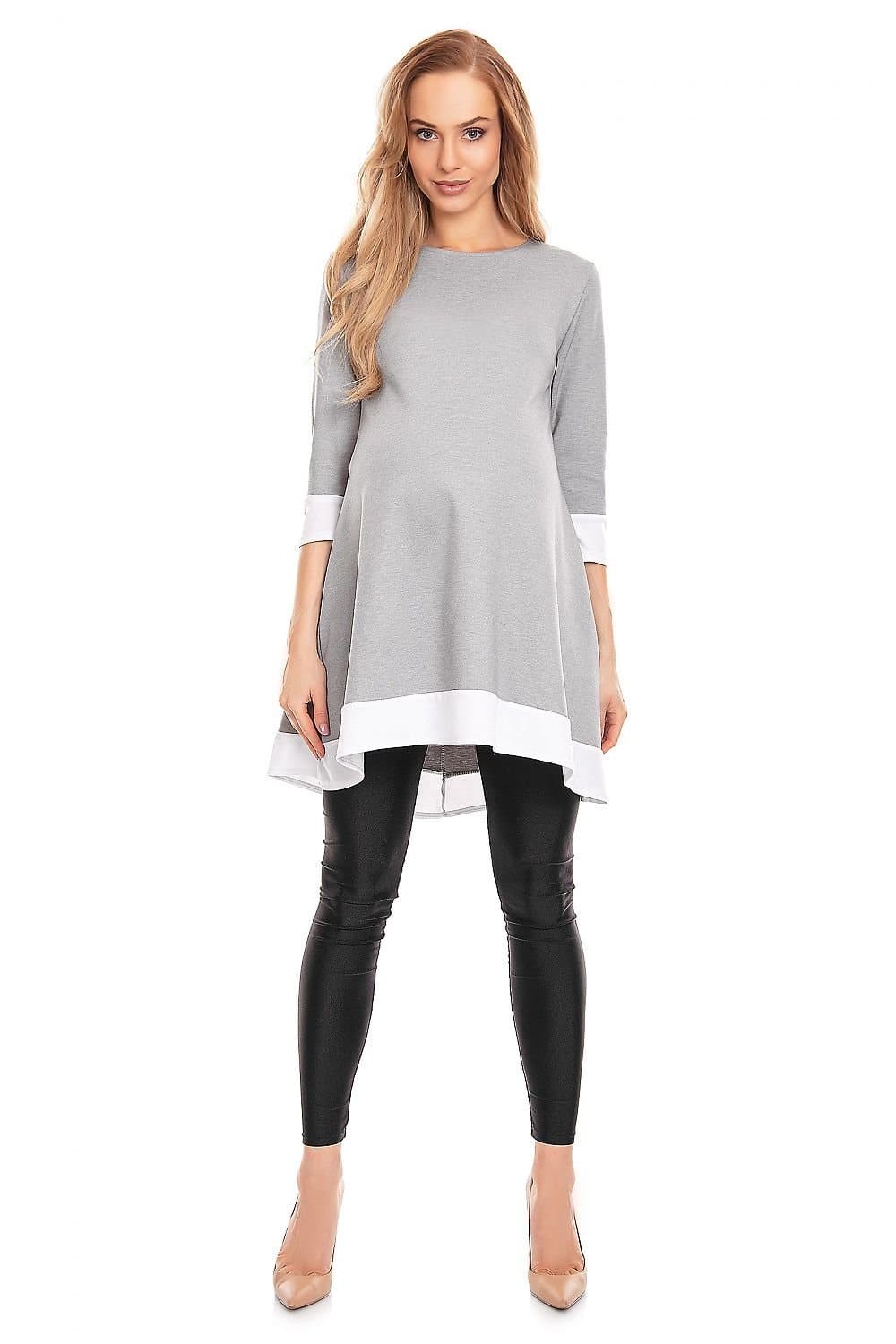 Robe de grossesse hiver confortable, style pull avec manches longues et ourlet blanc, idéale pour rester chic et au chaud.