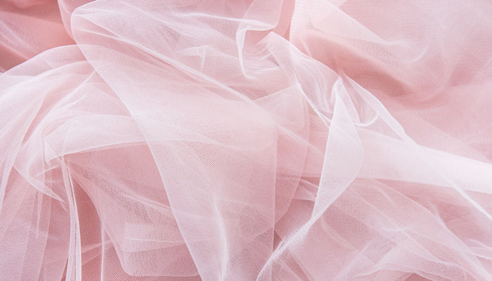 porter une robe rose poudre