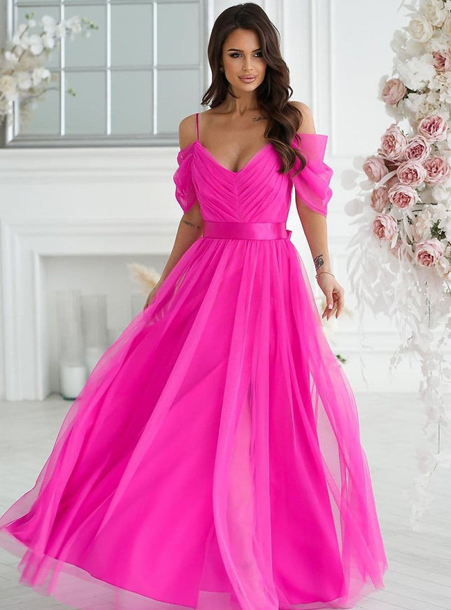 Robe soirée rose longue à épaules dénudées, style princesse et élégante pour événements festifs ou mariages.