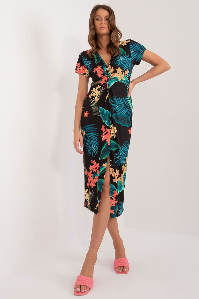 Robe fleurie midi d'été à manches courtes, idéale pour une tenue de plage ou une soirée décontractée.