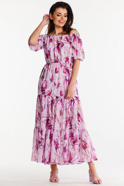 Robe bohème fleurie rose longue à manches courtes pour soirée estivale ou mariage invité chic.