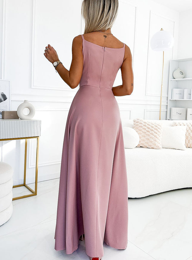 Robe soirée chic rose longue fendue pour événements élégants et occasions spéciales, avec un style féminin et tendance.