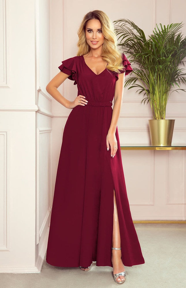 Robe soirée chic bordeaux longue sans manches avec détails volants pour événement élégant et style féminin.