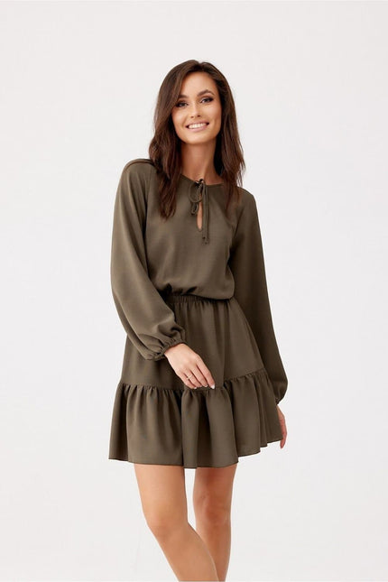 Robe verte fluide femme à manches longues, style décontracté et élégant, parfaite pour un look casual chic ou une soirée simple.