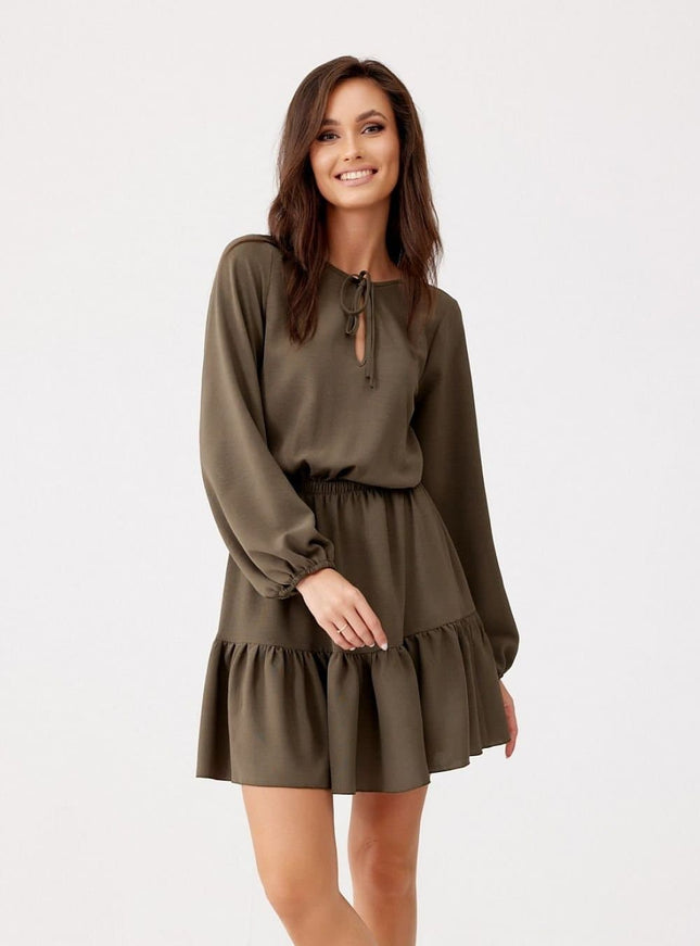 Robe verte fluide femme à manches longues, style décontracté et élégant, parfaite pour un look casual chic ou une soirée simple.