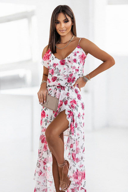 Robe fleurie blanche et rose pour plage, style midi et sans manches, idéale pour sorties estivales et occasions décontractées.