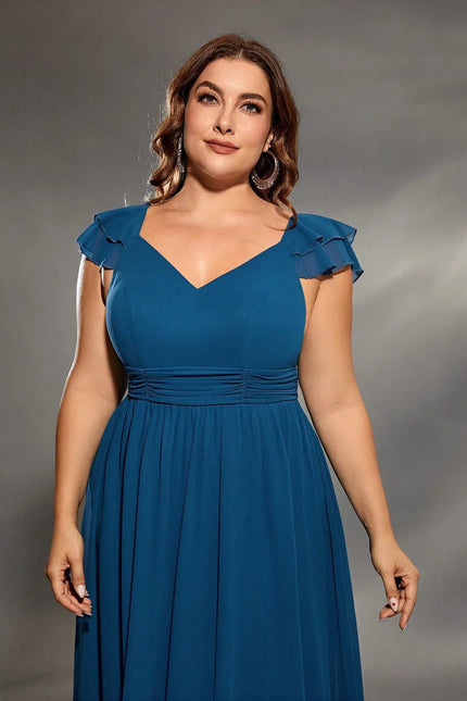 Robe amincissante bleue, moulante et longue avec manches courtes pour mariage grande taille.