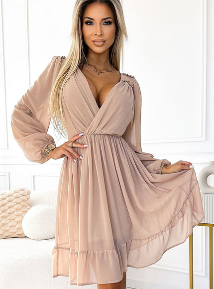 Robe cocktail rose midi avec manches longues et décolleté, idéale pour un look chic et élégant lors d'événements spéciaux.