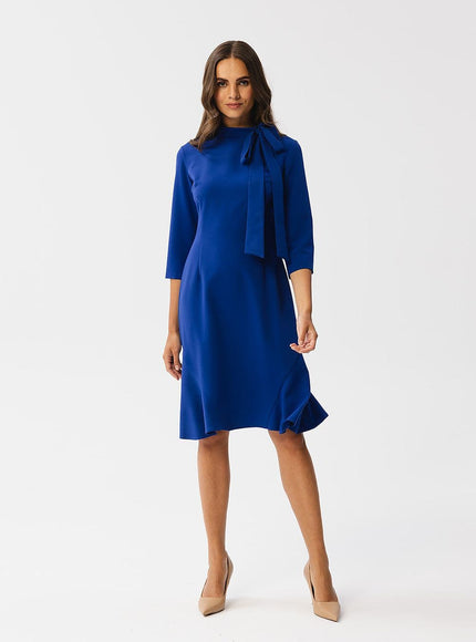 Robe bleue midi chic avec manches courtes et nœud pour cocktail ou soirée, idéale pour une silhouette élégante et moderne.