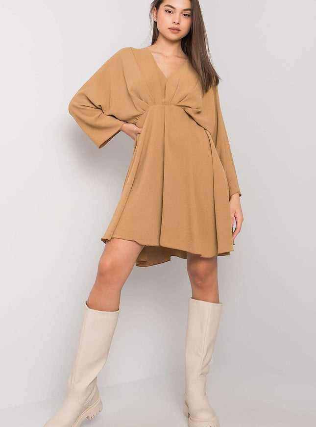 Robe bohème terracotta midi à manches longues pour un look chic et confortable, idéale pour les occasions décontractées ou sorties en ville.