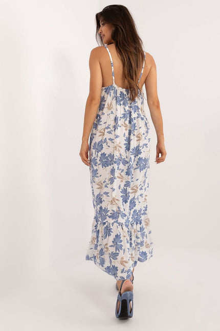 Robe longue blanche et bleue à motif floral, style bohème, idéale pour plage ou bal d'été, sans manches.