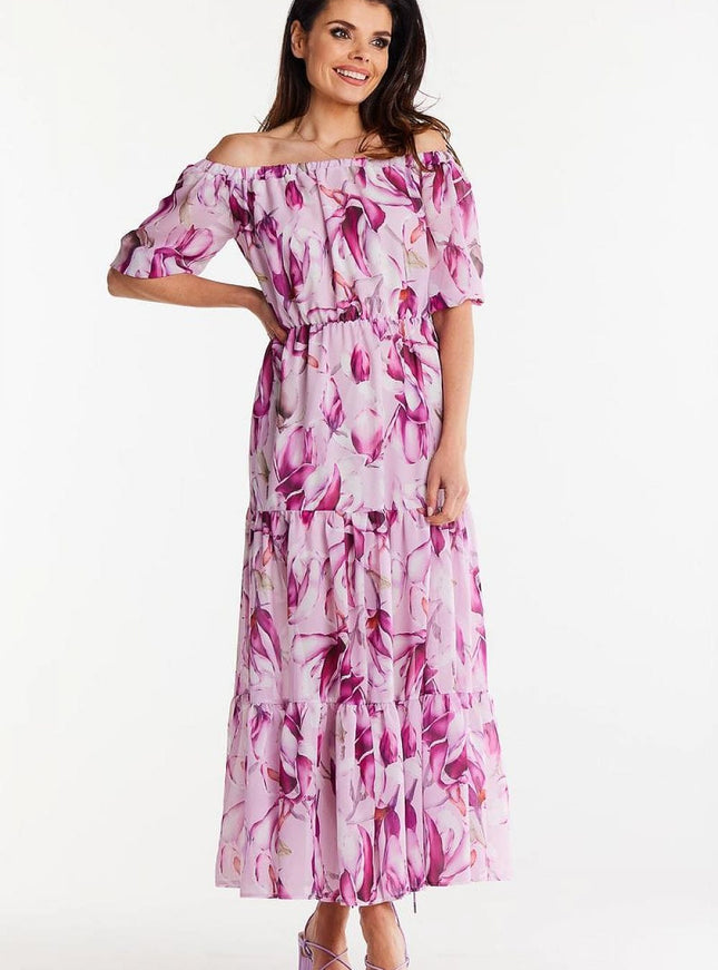 Robe bohème fleurie rose longue à épaules dénudées idéale pour mariage invité chic ou soirées d'été.