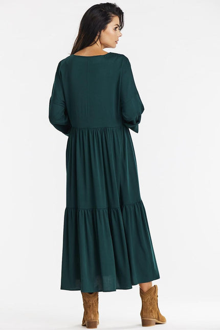 Robe verte midi chic avec manches longues pour cocktail ou événement soirée.