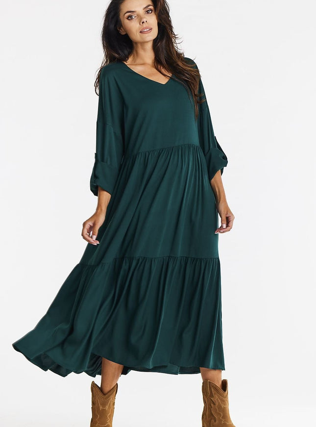 Robe verte midi décontractée à manches longues pour soirée simple ou bal.