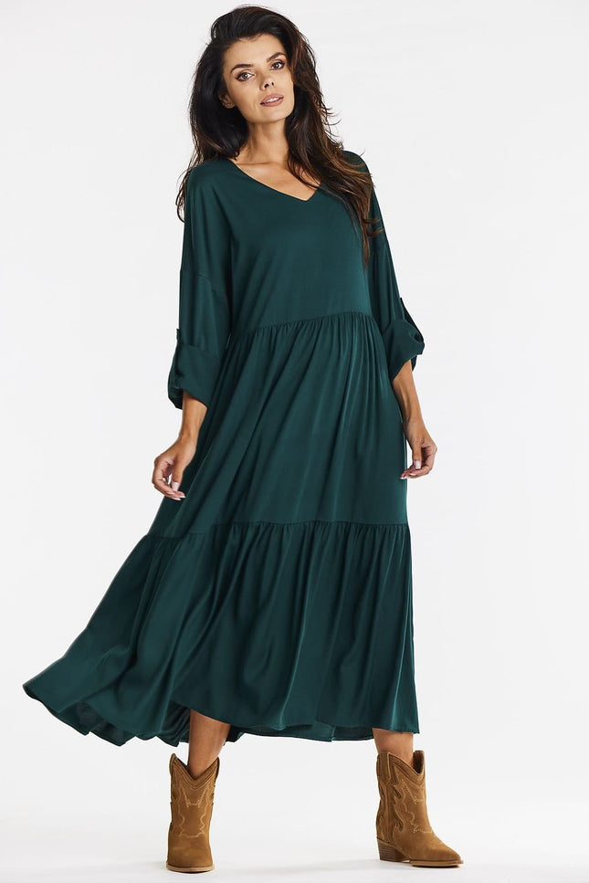 Robe verte midi décontractée à manches longues pour soirée simple ou bal.