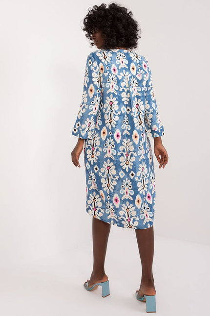 Robe bohème midi fleurie bleue avec manches longues pour un style décontracté et élégant, idéale pour une sortie ou un événement de jour.