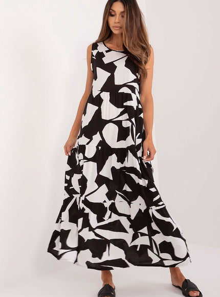 Robe casual longue noire et blanche, sans manches avec motif géométrique, idéale pour une tenue décontractée quotidienne.