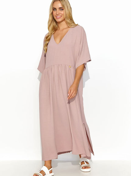 Robe casual rose midi à manches courtes pour une tenue quotidienne confortable et tendance, idéale pour balade en ville ou apéritif décontracté.