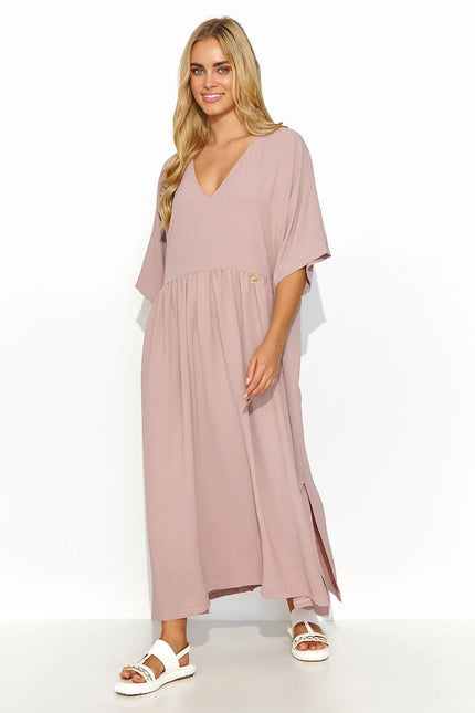 Robe casual rose midi à manches courtes pour une tenue quotidienne confortable et tendance, idéale pour balade en ville ou apéritif décontracté.