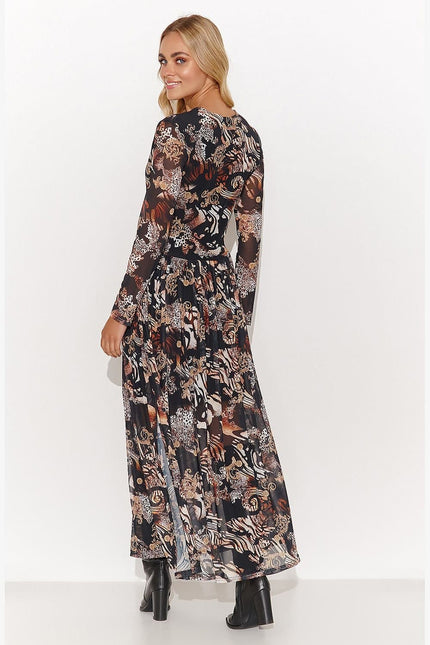 Robe champêtre longue à manches longues et imprimé floral dans les tons marron et beige, idéale pour une soirée ou un évènement bohème.