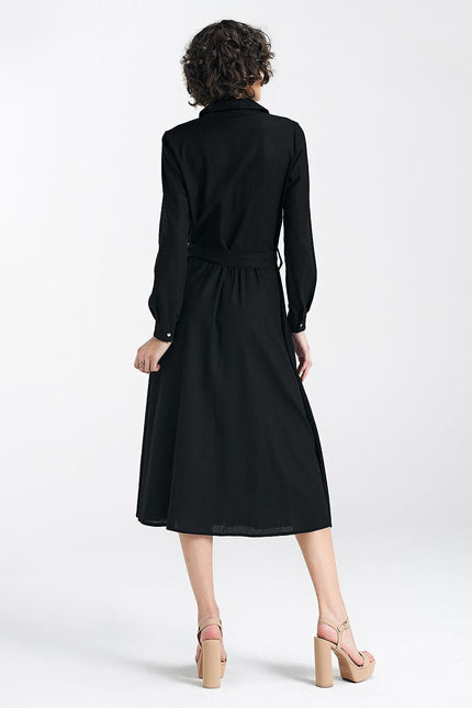 Robe chemise noire midi casual à manches longues pour un style décontracté et élégant.