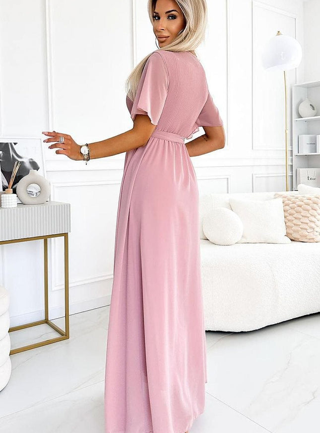 Robe soirée chic rose longue fluide avec manches courtes et ceinture élégante pour occasions festives.