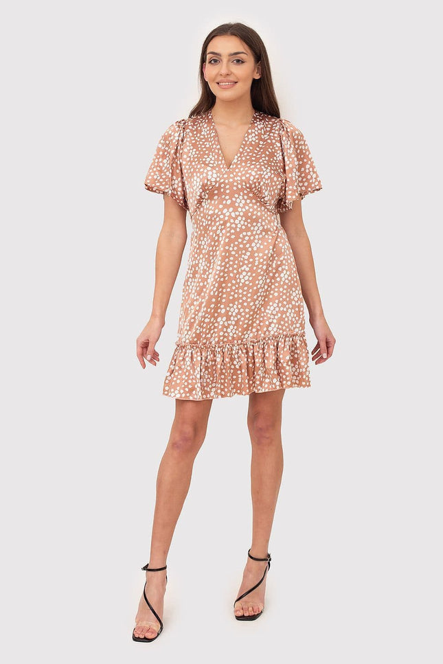 Robe terracotta à pois casual courte avec manches courtes et col en V pour femme, idéale pour une tenue de journée ou une sortie décontractée.