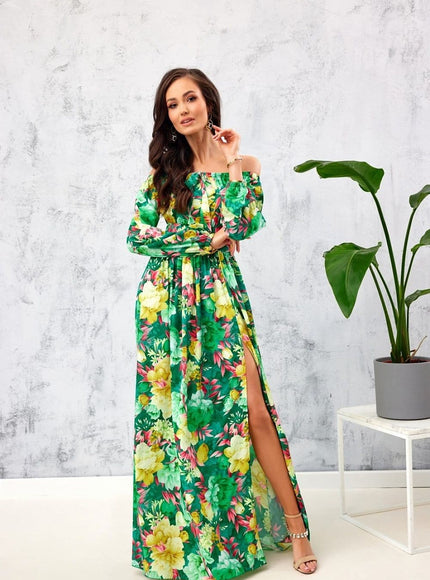 Robe d'été fleurie longue avec épaules dénudées et fente, idéale pour soirée ou événement estival.